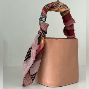 Leather bucket bag with the scarf